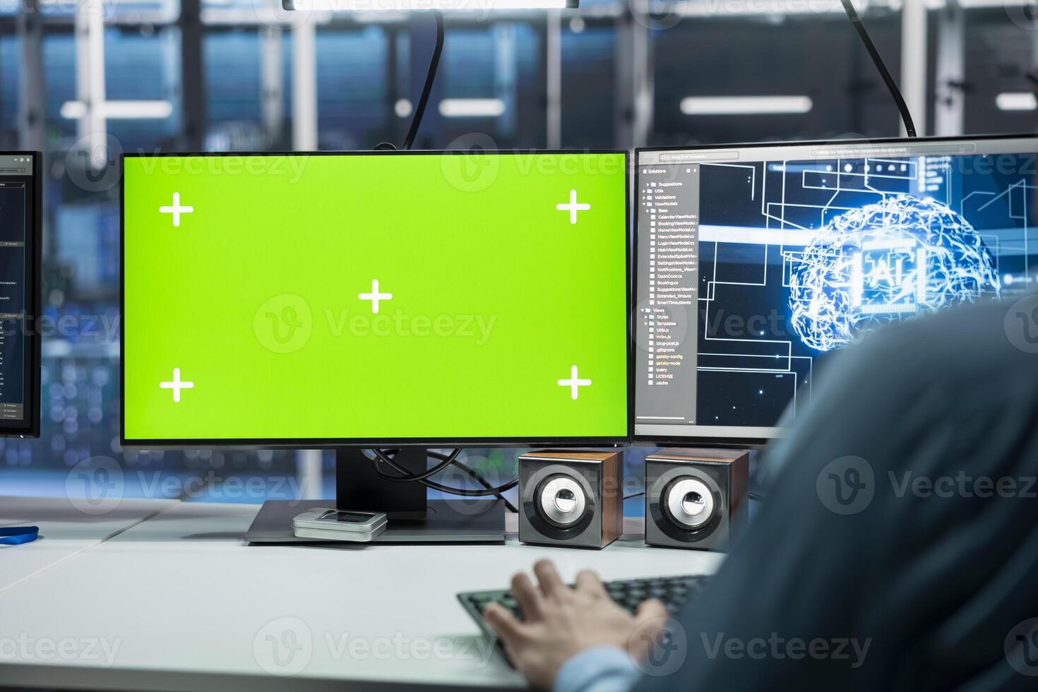 Close up of server room IT specialist using isolated screen PC, deploying deep learning technology. Data center engineer using mockup computer, managing datasets used in neural networks training photo