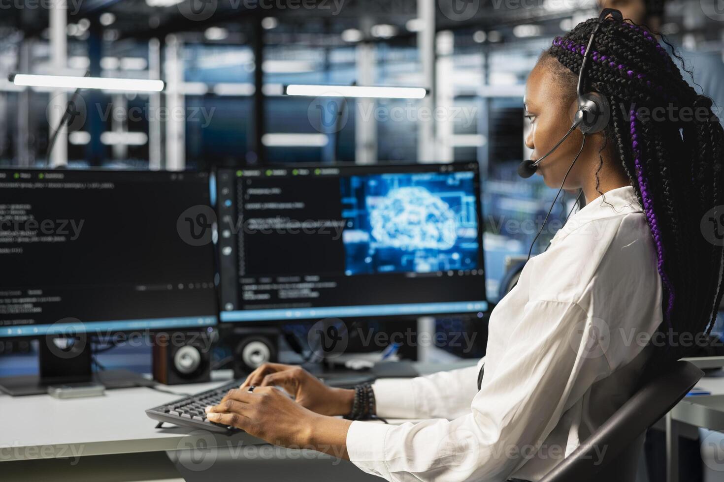 Data center admin speaking in headset mic, using AI assistant to provide user technical support. Server hub IT professional assisting clients during remote call using artificial intelligence photo