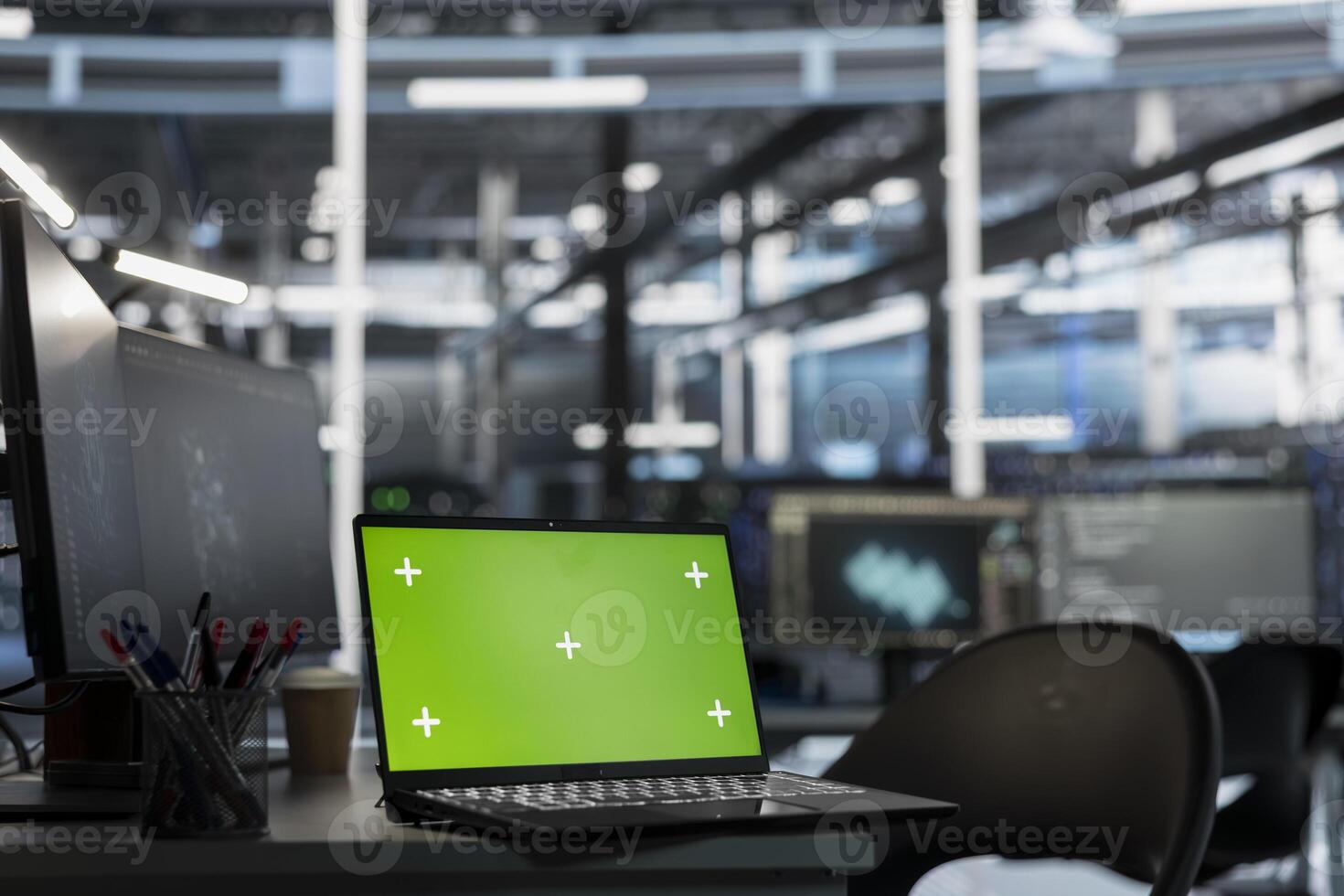 Green screen laptop monitoring data center gear delivering computing power for AI deep learning pipelines. Chroma key notebook used for overseeing mainframes storing artificial intelligence datasets photo