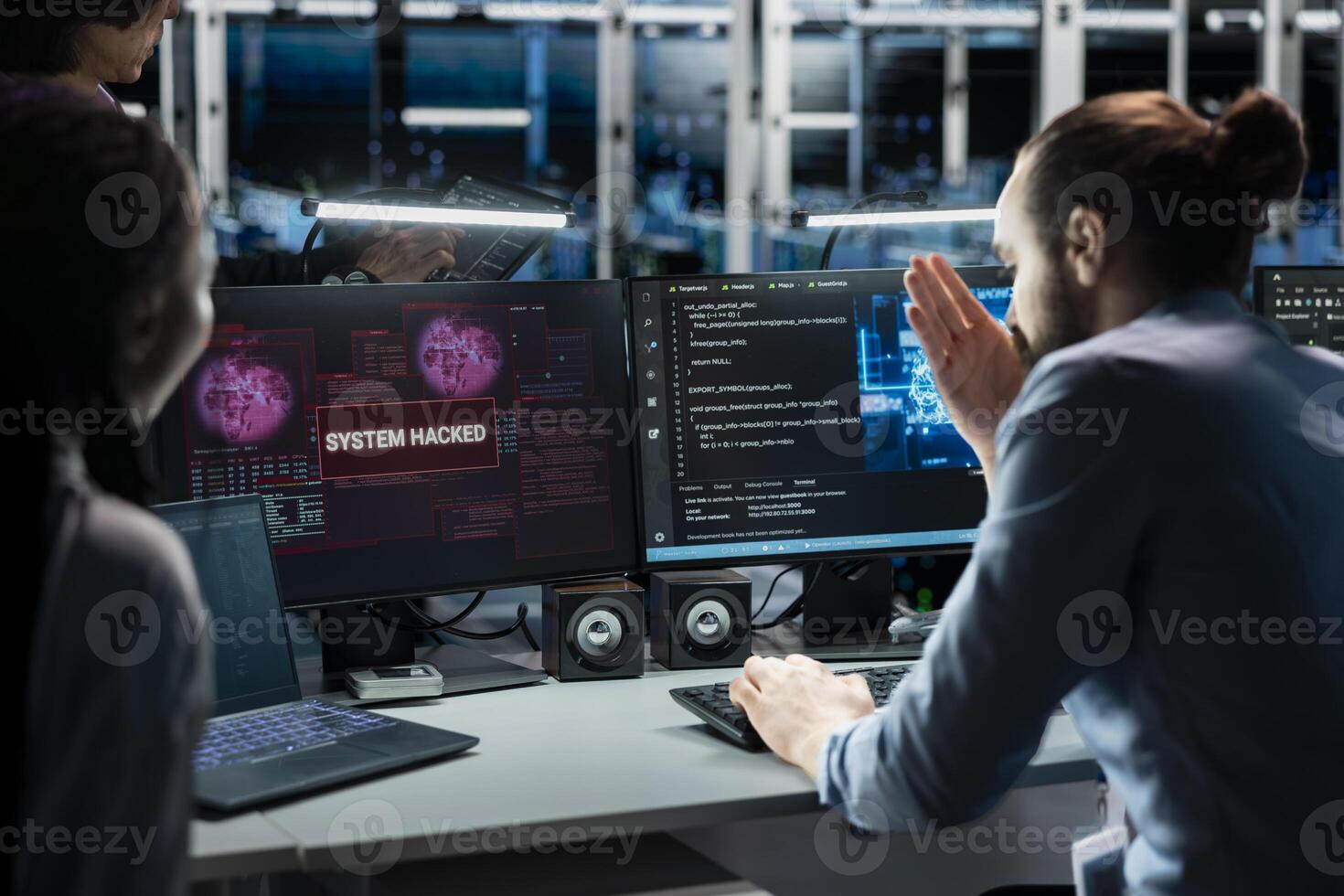 Technicians in AI server farm doing brainstorming to fix hacking incident involving theft of sensitive data. Data center coworkers working together to stop computer virus triggered by security systems photo