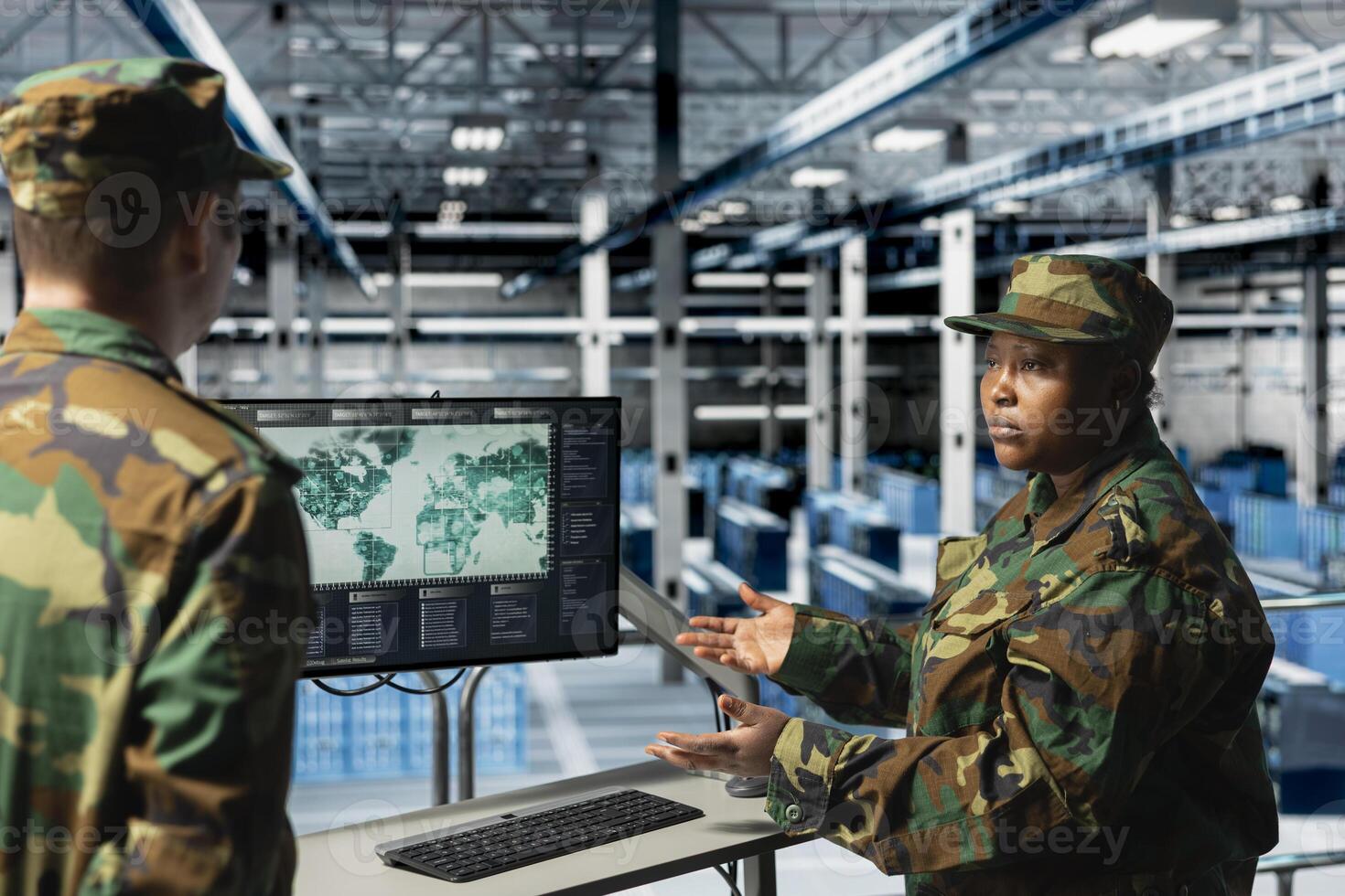 Team of military experts in data center looking at world map, coordinating mission zones. Army units in server farm looking at global map, commanding remote battlefield operations photo
