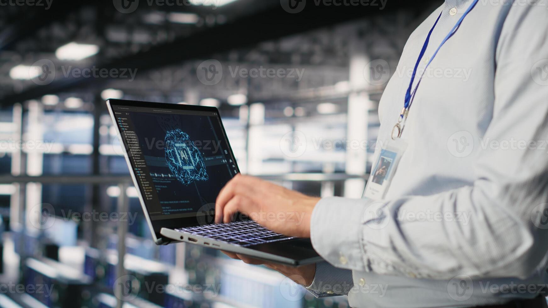 Close up of IT specialist in server room doing AI deep learning automatization. Data center software developer using notebook, doing hardware maintenance using AI photo