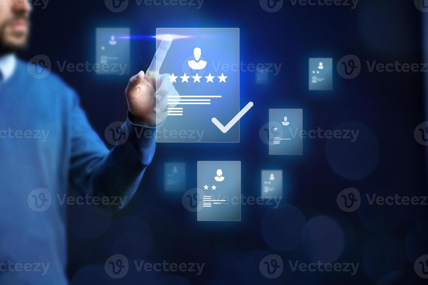 Man interacting with digital interface to evaluate user profiles with ratings and selections in a modern workspace setting photo