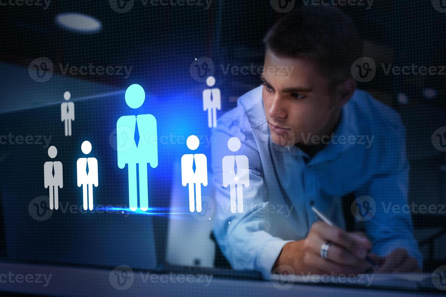 Innovative professional analyzing data and trends using technology in a modern workspace photo