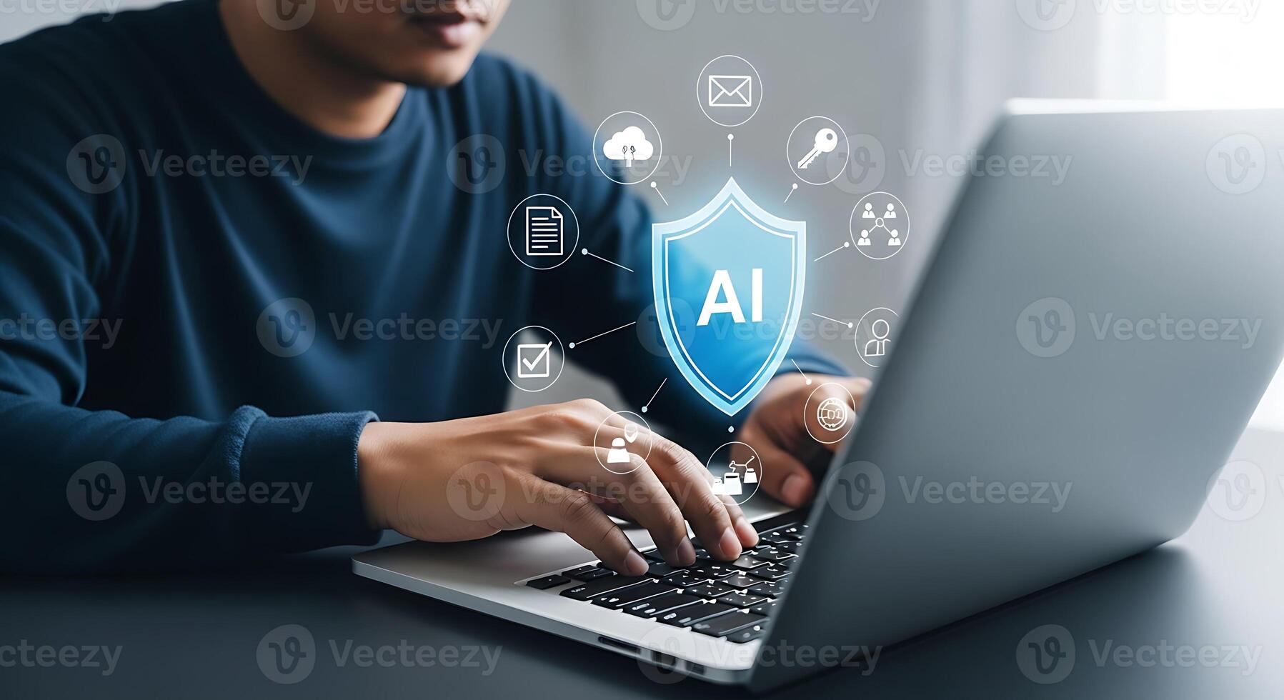 Person using a laptop with ai and cybersecurity shield graphic overlay concept for digital technology and data protection photo