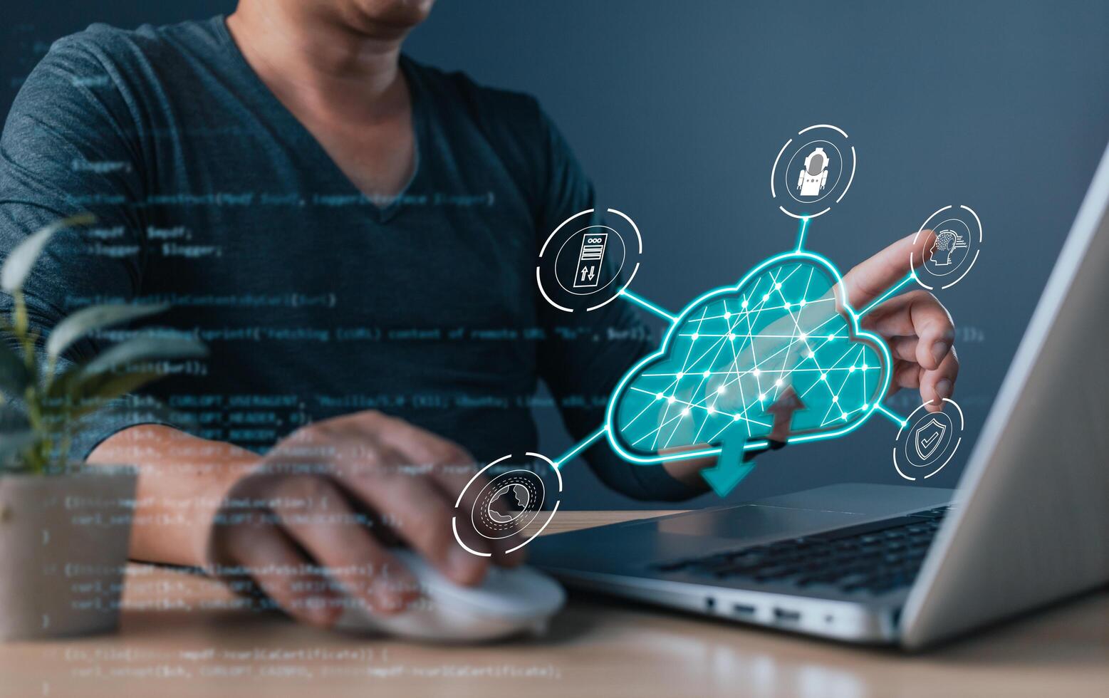 professional uses a laptop with a holographic cloud computing, symbol cloud technology, digital transformation, data management, cybersecurity, and system efficiency in modern tech solutions. photo
