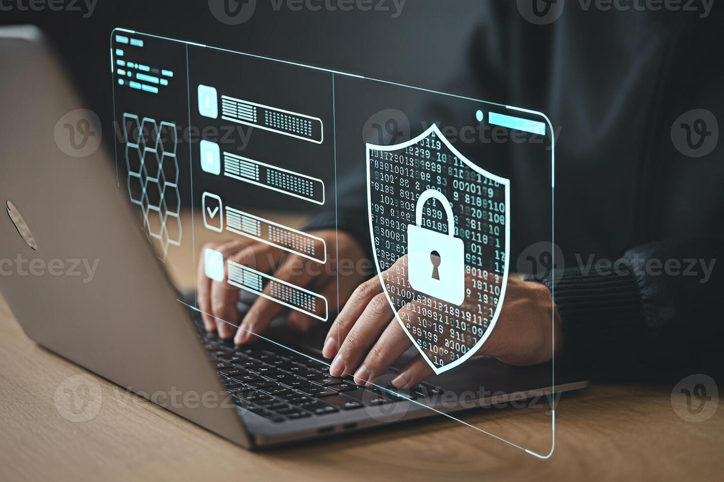 Cybersecurity concept person using laptop with digital security shield and data protection overlay photo
