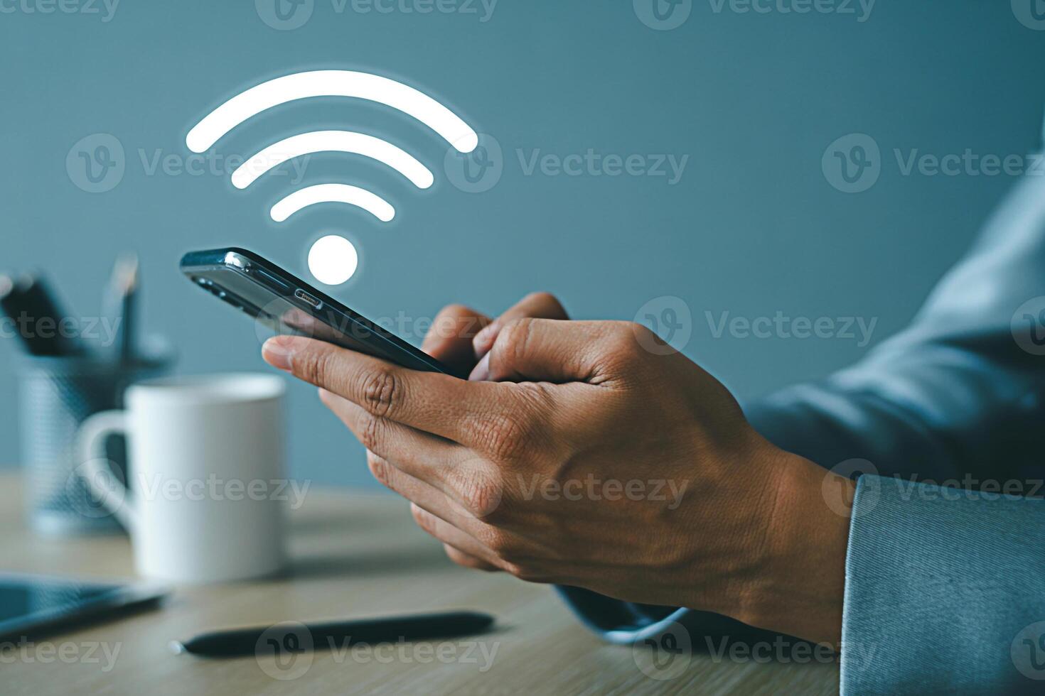 Connected to wifi using smartphone for internet access and mobile data connection for communication photo