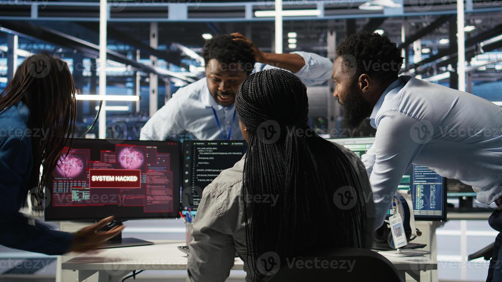 Technicians in AI server hub collaborate to protect against data theft during active threat. Data center team working together to safeguard equipment and systems during security breach, camera A photo