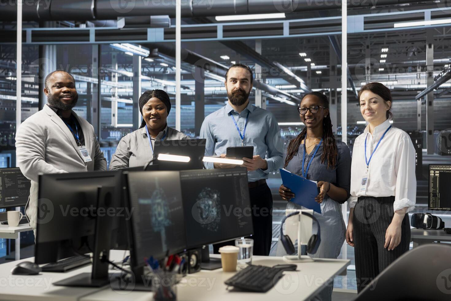 Portrait of smiling engineering team working in server farm, analyzing data. Happy teamworking employees examining infrastructure in data center, ensuring system integrity and security photo
