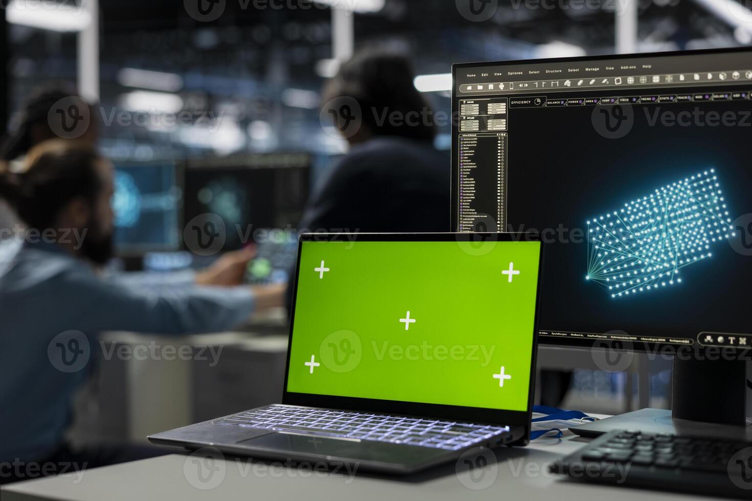 Close up of green screen laptop used by developers in data center using AI LLM assistant to do maintenance. Chroma key notebook used by server hub workers using large language model to do backups photo