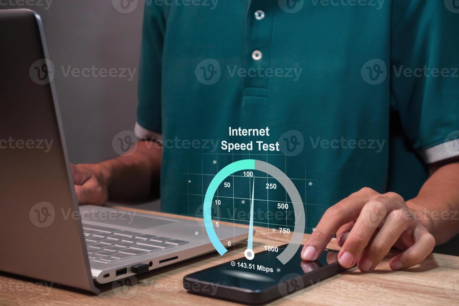 A man working on laptop and checking the internet speed. Internet network connection speed test concept. photo