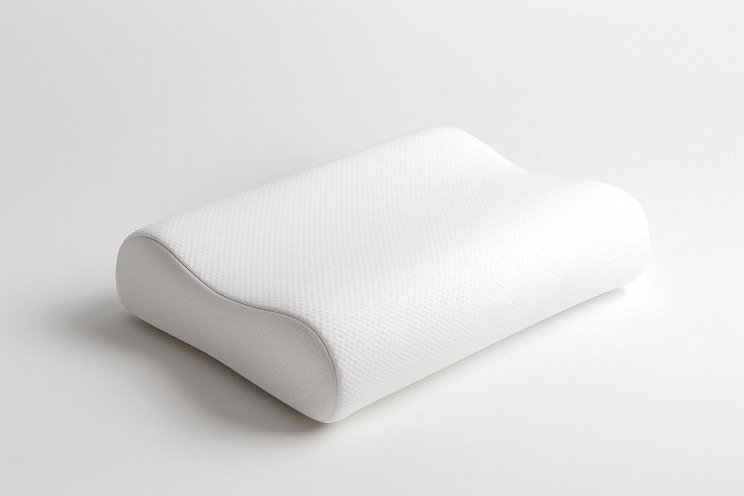 Orthopedic contour memory foam pillow on a clean white background with soft shadow. Minimal product shot with copy space. photo