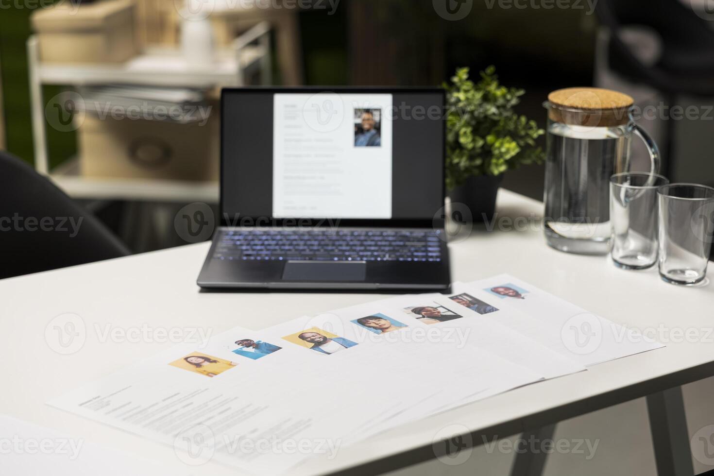 Empty office with a laptop showcasing CV candidate before job interview, space used for the recruitment process and reviewing qualifications or past work experience to align with vacancy. photo