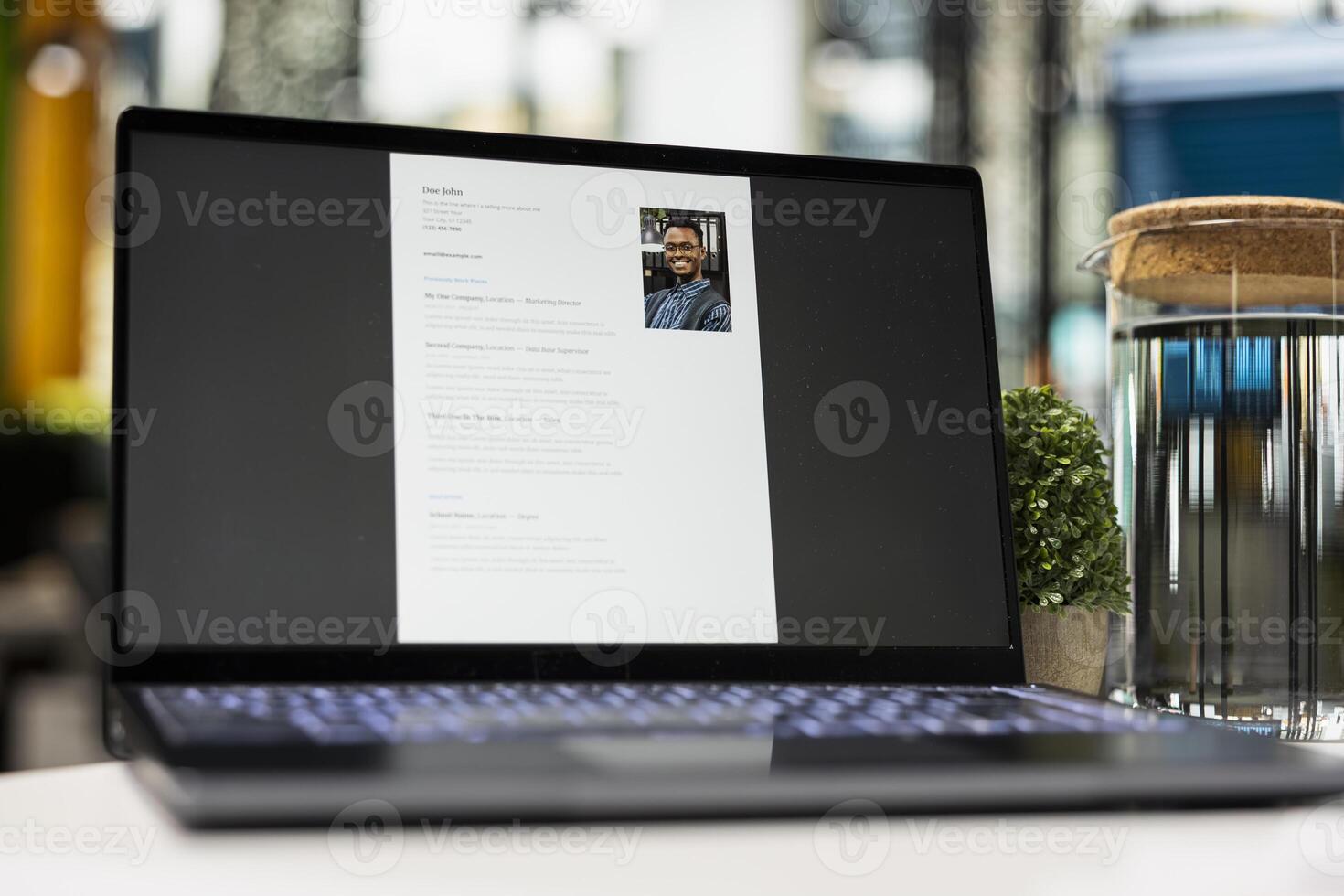 Close up of laptop in empty space shows applicant CV before hiring interview, office used for the recruitment process and reviewing qualifications or work experience to align with position. photo