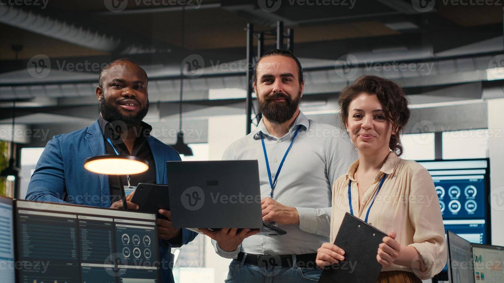 Team of office workers collaborating on project planning and briefing, using data from charts on tablet to drive performance metrics. Fostering teamwork and a workplace partnership. photo