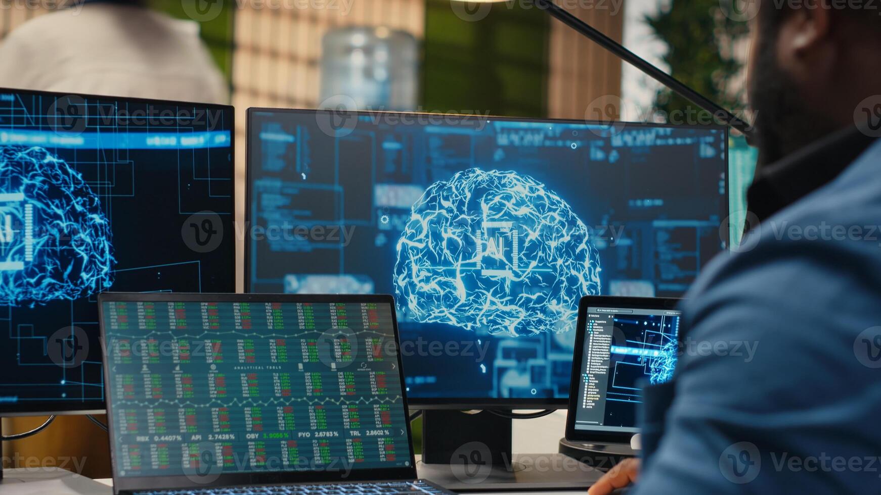 Black man IT expert handles neural networks systems for data forecasting, combining AI automation tools with digitalization to drive multinational company efficiency and innovation. Camera B. photo