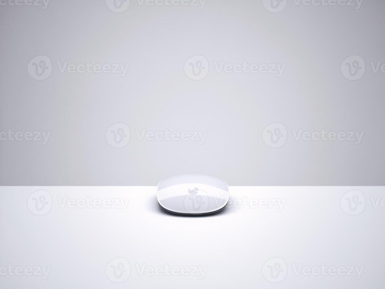 A sleek, glossy white device resting on a minimalistic white surface with a soft glow. photo