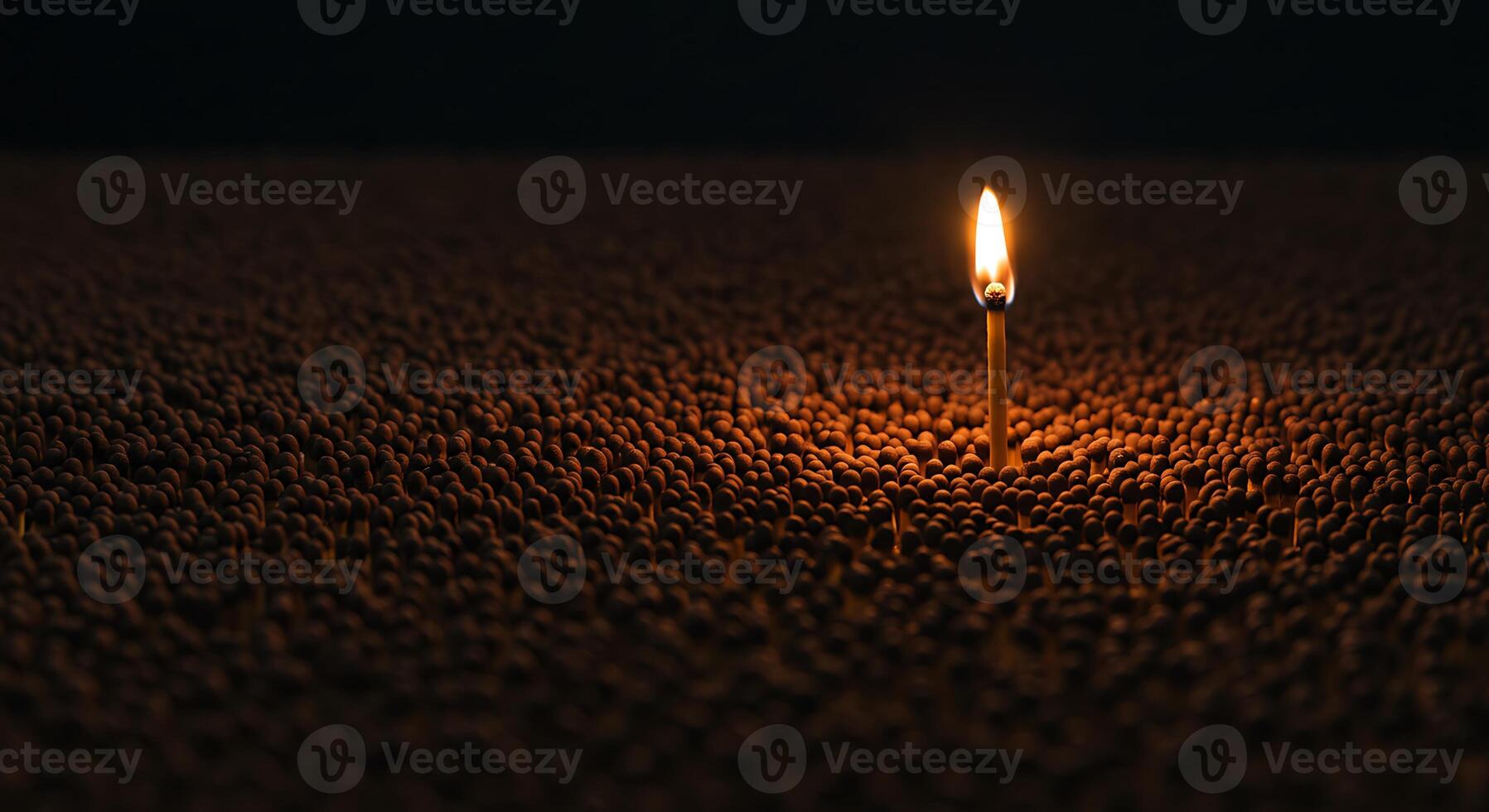 Single Lit Candle Standing Upright on Dark Surface Surrounded by Many Small Round Objects in Low Light photo