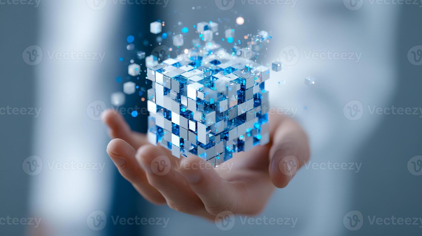 Hands holding a digital 3d cube display with thumbnails of binary code and modern technology elements photo