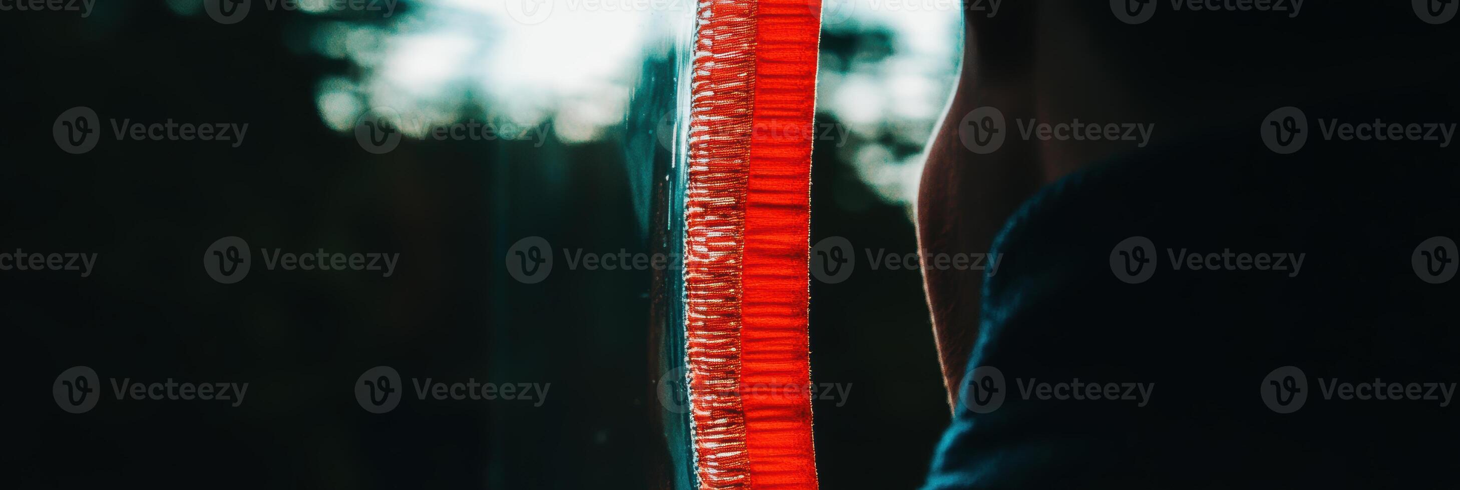 Captivating moment of reflection by a colorful window in a serene natural setting photo
