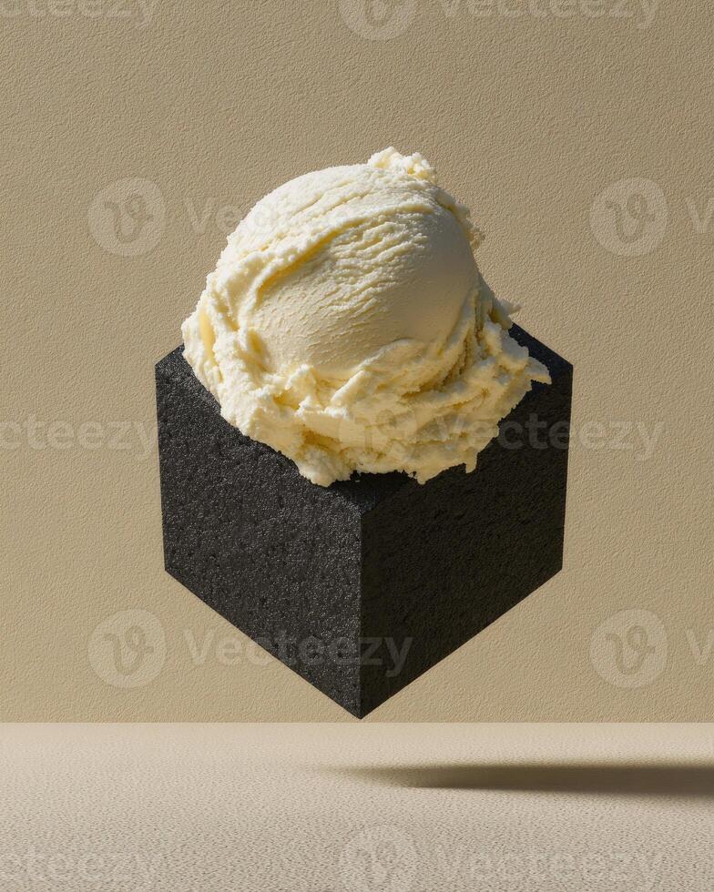A black block with a scoop of ice cream in it photo
