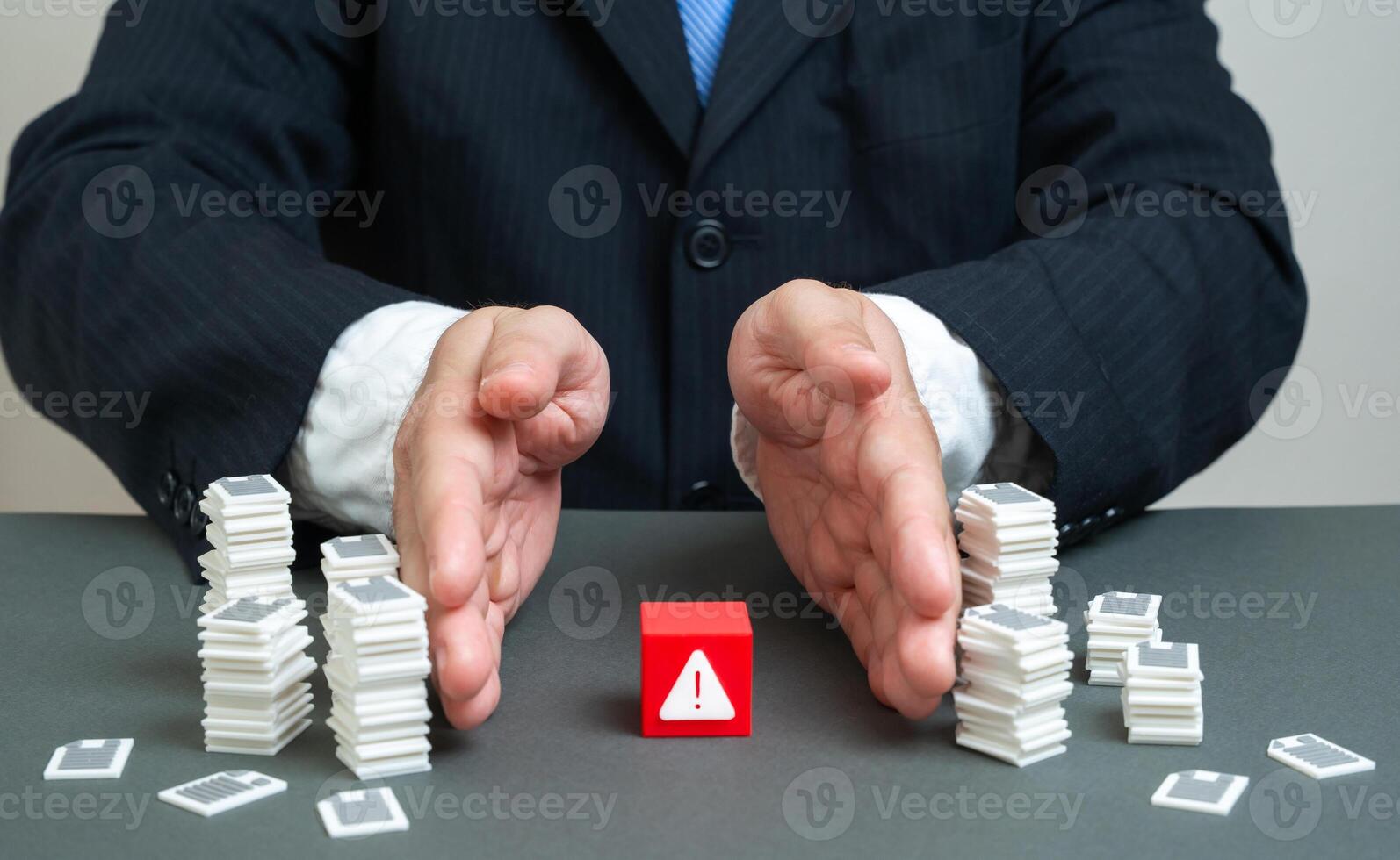 Businessman finds a problem among mountains of papers and reports. Big data and methods for processing it. Information overload, data analytics, digital transformation, AI solutions, efficiency tools photo