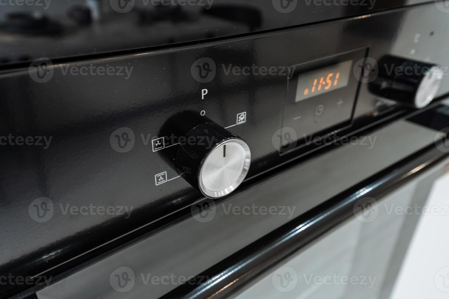 A clear view of the ovens knobs and display is crucial for precise temperature settings, enhancing the design and functionality of modern kitchen appliances for baking and cooking photo