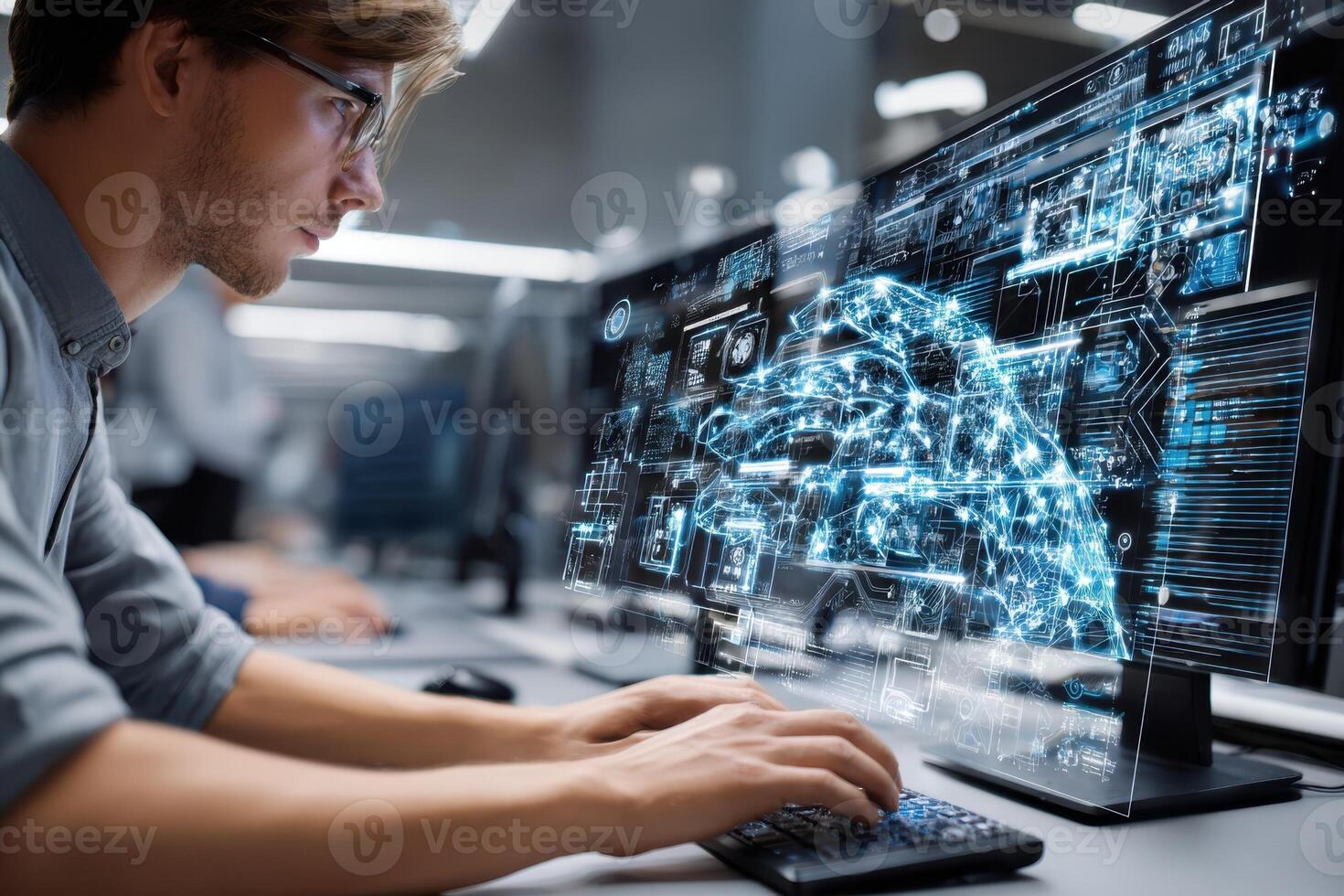 Young man working on computer with digital interface displaying complex data analysis photo