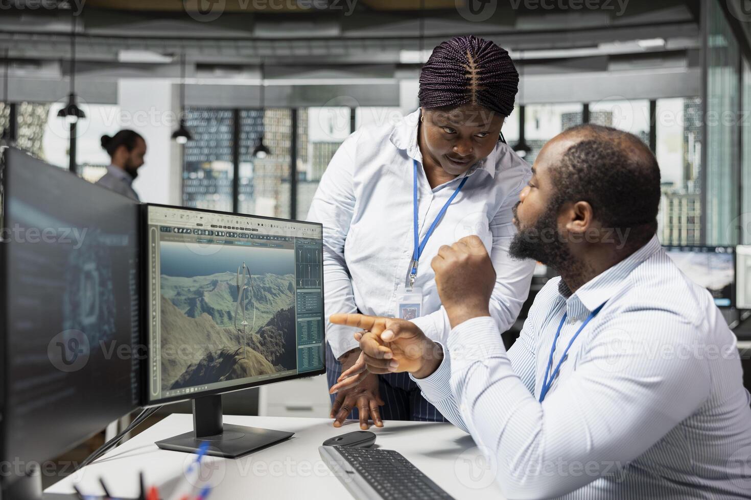 Team of technicians use AI assistant to analyze advanced wind turbine models, improving efficiency. Teamworking colleagues use artificial intelligence to create innovative VAWT turbine in CAD software photo