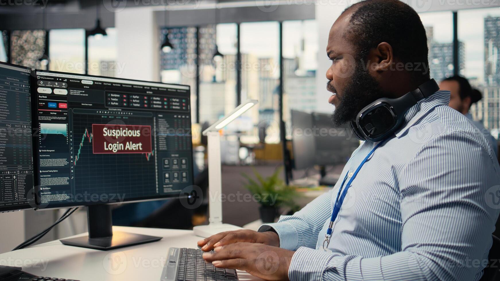 Stressed trader at work investigating suspicious access on trading account after system triggers warning. Broker worried about security popup on PC about attempted breach of client account photo