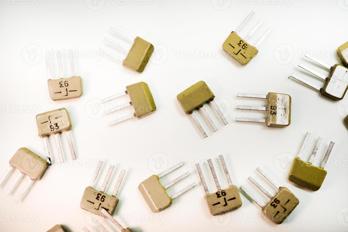 Power transistors on a white background. Semiconductor components. Microelectronics. photo