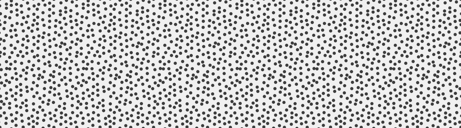 Abstract monochrome dotted pattern. A seamless texture of small, randomly dispersed black dots on a white background. vector