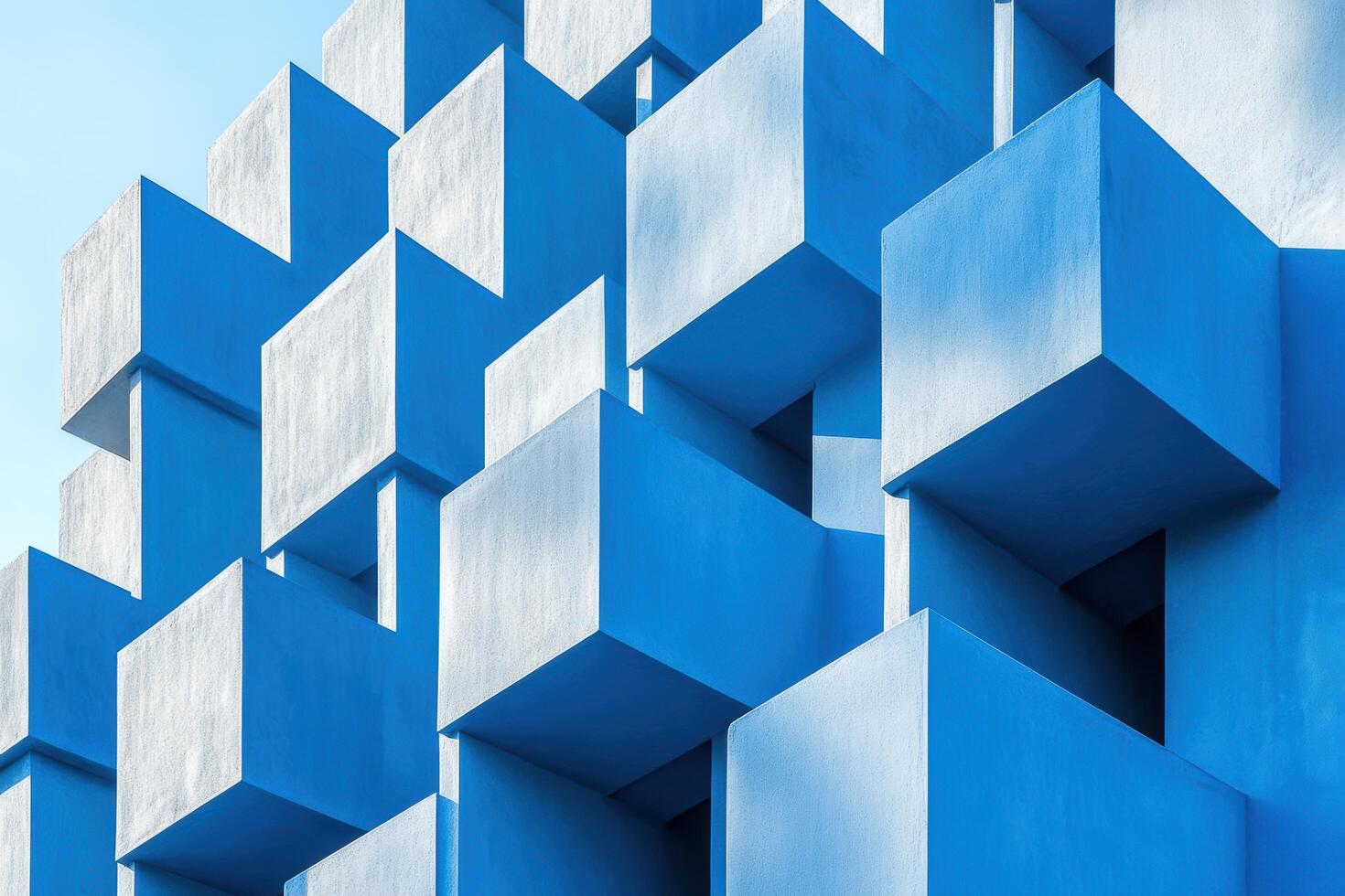 Geometric blue structures create dynamic visual interest in urban setting photo