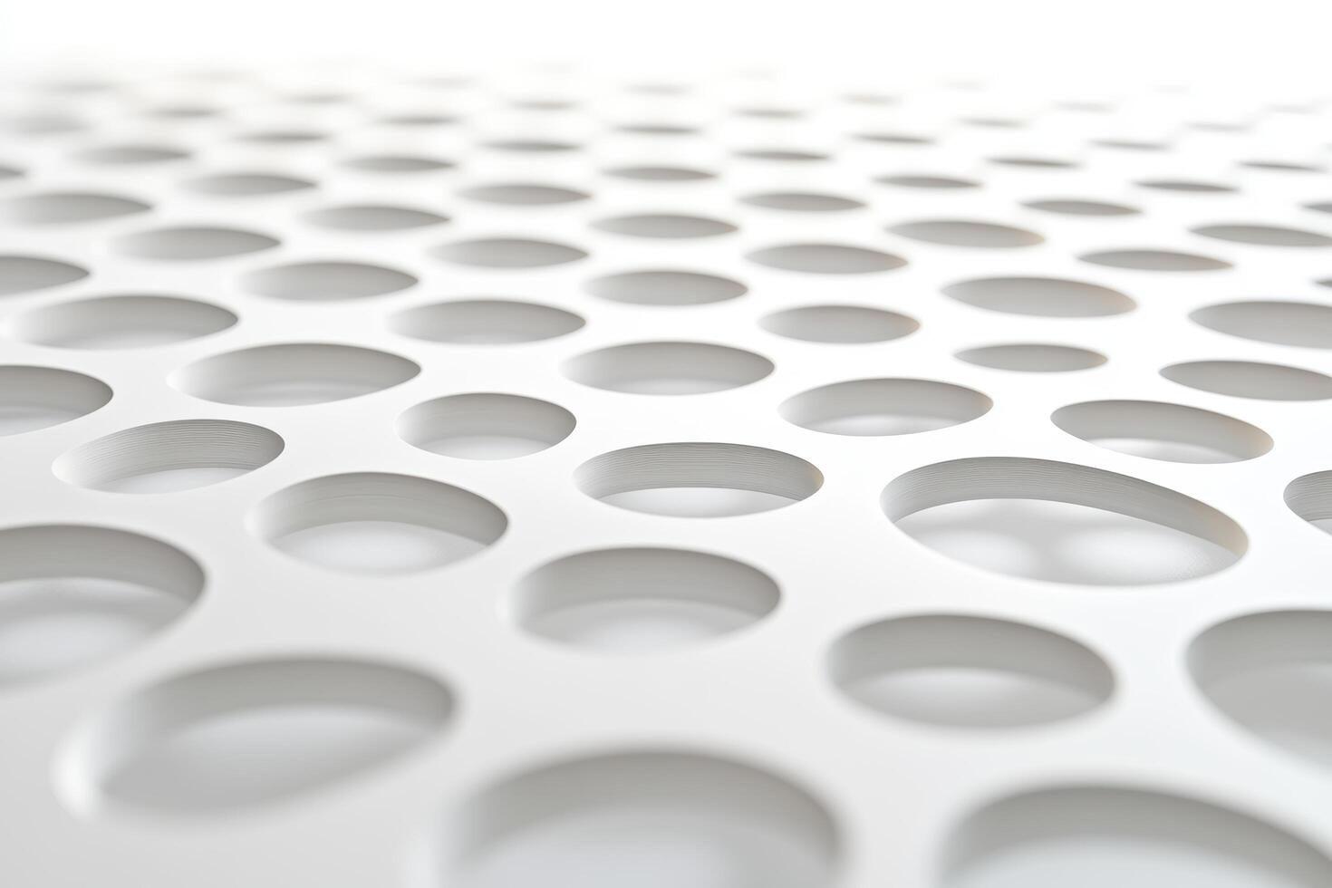 Intricate pattern of perforated material showcasing design and texture photo