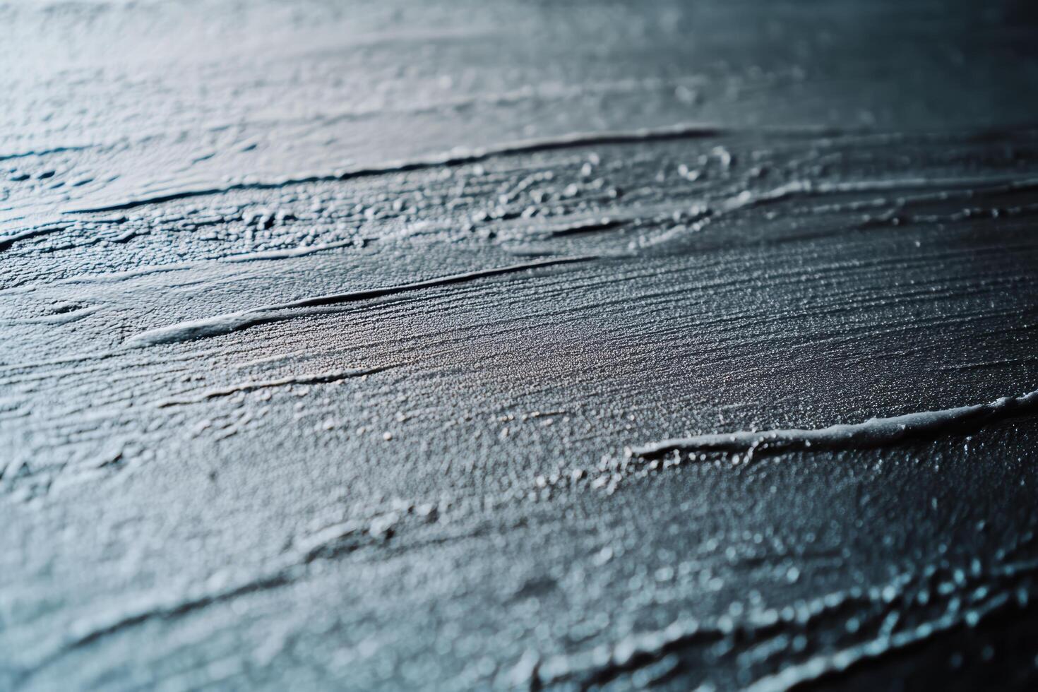 Textured surface with intricate lines and patterns in soft lighting photo