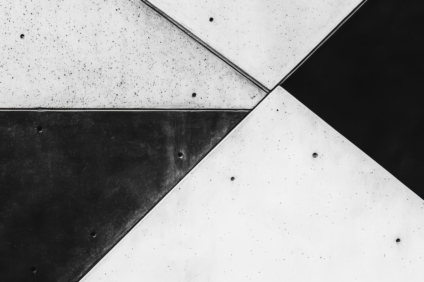 Concrete geometric patterns create a striking visual of shapes and textures photo