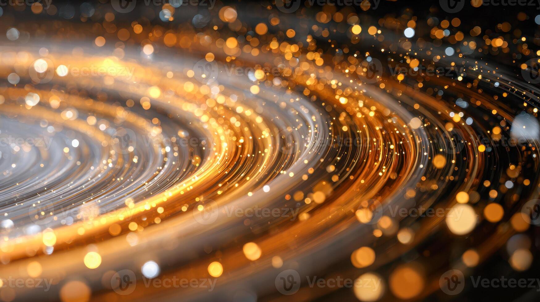 Close-up of bright swirling golden light trails with sparkling bokeh particles creating a dynamic and abstract futuristic background in dark space photo