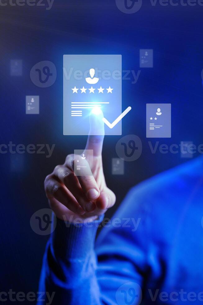 User interacts with digital interface to select five-star feedback during online review process in a tech environment photo
