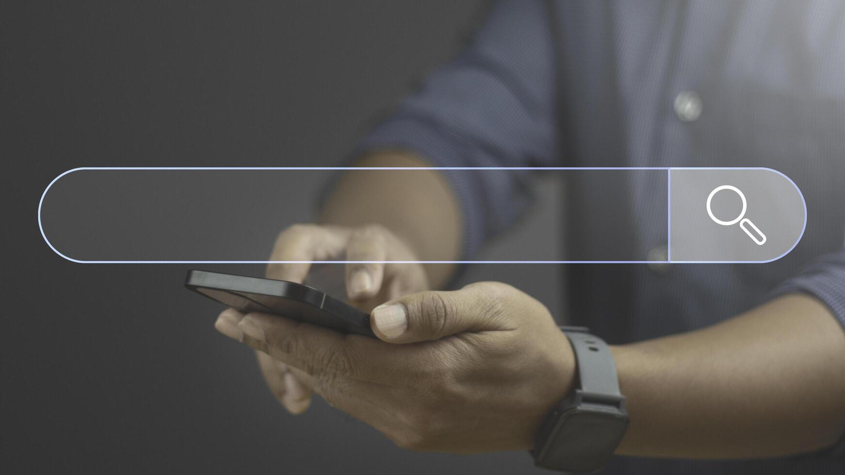 Search Engine Optimization SEO Networking Concept. Businessman using smartphone with virtual search bar. photo