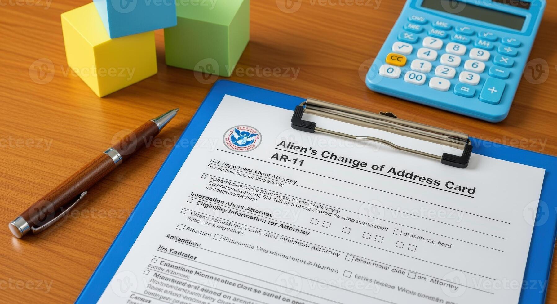Immigration Change of Address Form on Clipboard with Pen and Calculator for Legal Documentation photo
