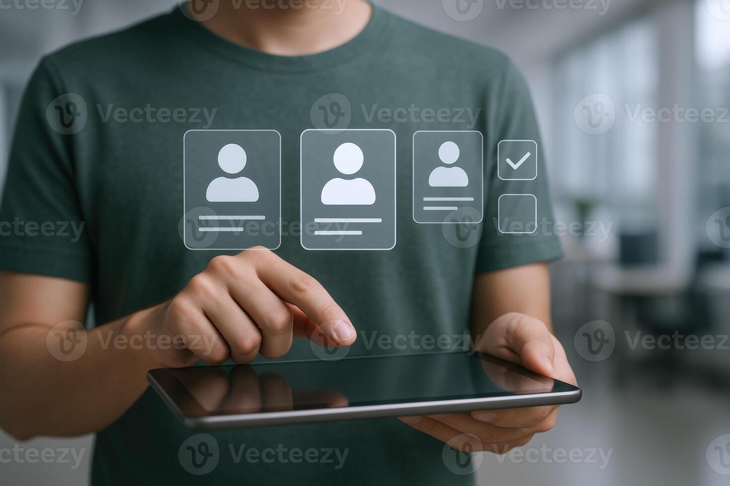 Hiring Manager Reviewing Candidate Profiles on a Tablet Device for Recruitment and Selection Process photo