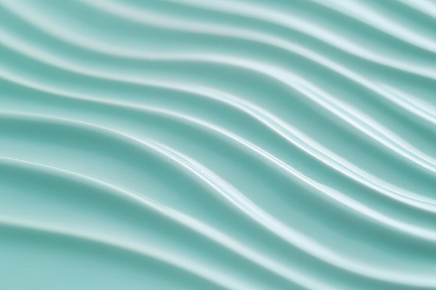 Wavy patterns create a calming texture on smooth aqua surface photo