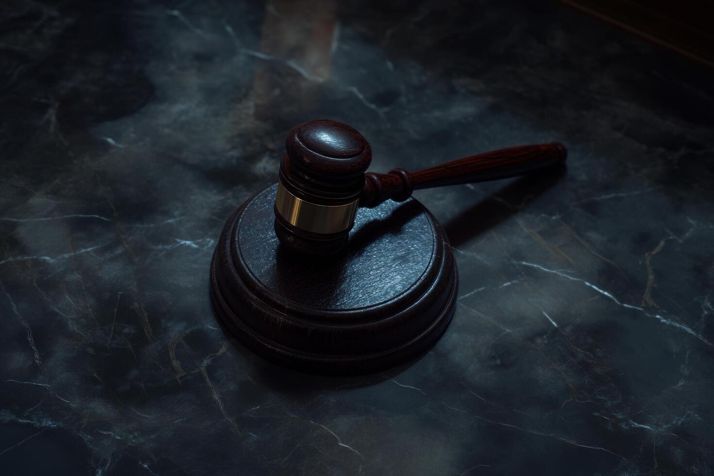 A judge's gavel on a table photo