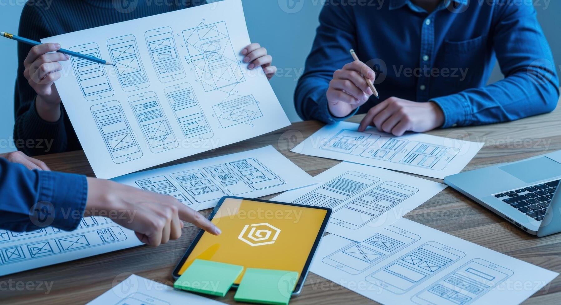 Collaborative UIUX Design Session Team Brainstorming App Interface and User Experience on Tablet photo