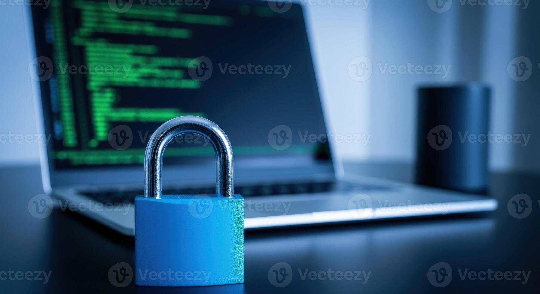 Cybersecurity Concept Padlock in Focus with Laptop Displaying Coding, Representing Data Protection photo