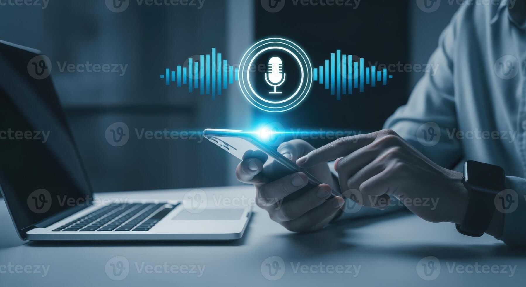 Man using voice assistant, audio wave and microphone on smartphone with laptop on the table photo