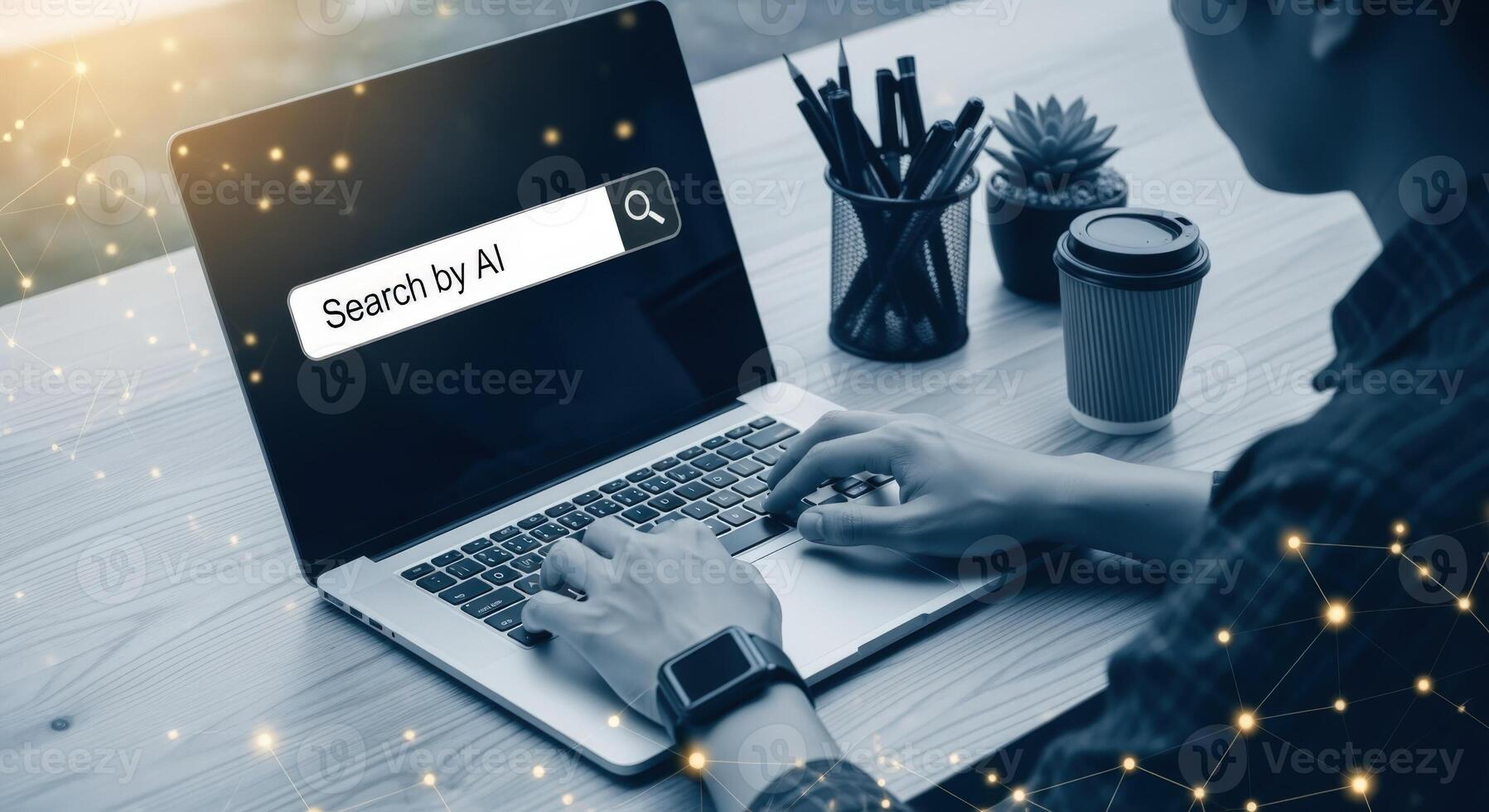 Man Typing on Laptop with AI Search Bar Displayed, Representing Artificial Intelligence and Technology photo