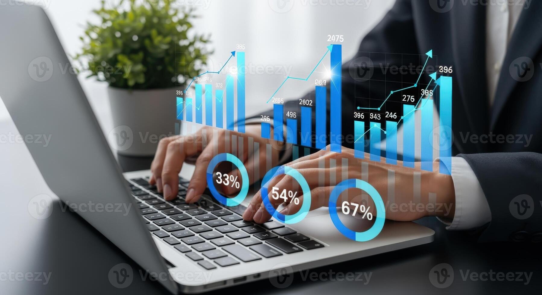 Financial Analyst Reviewing Data Analytics and Business Intelligence Visualizations on a Laptop Computer photo
