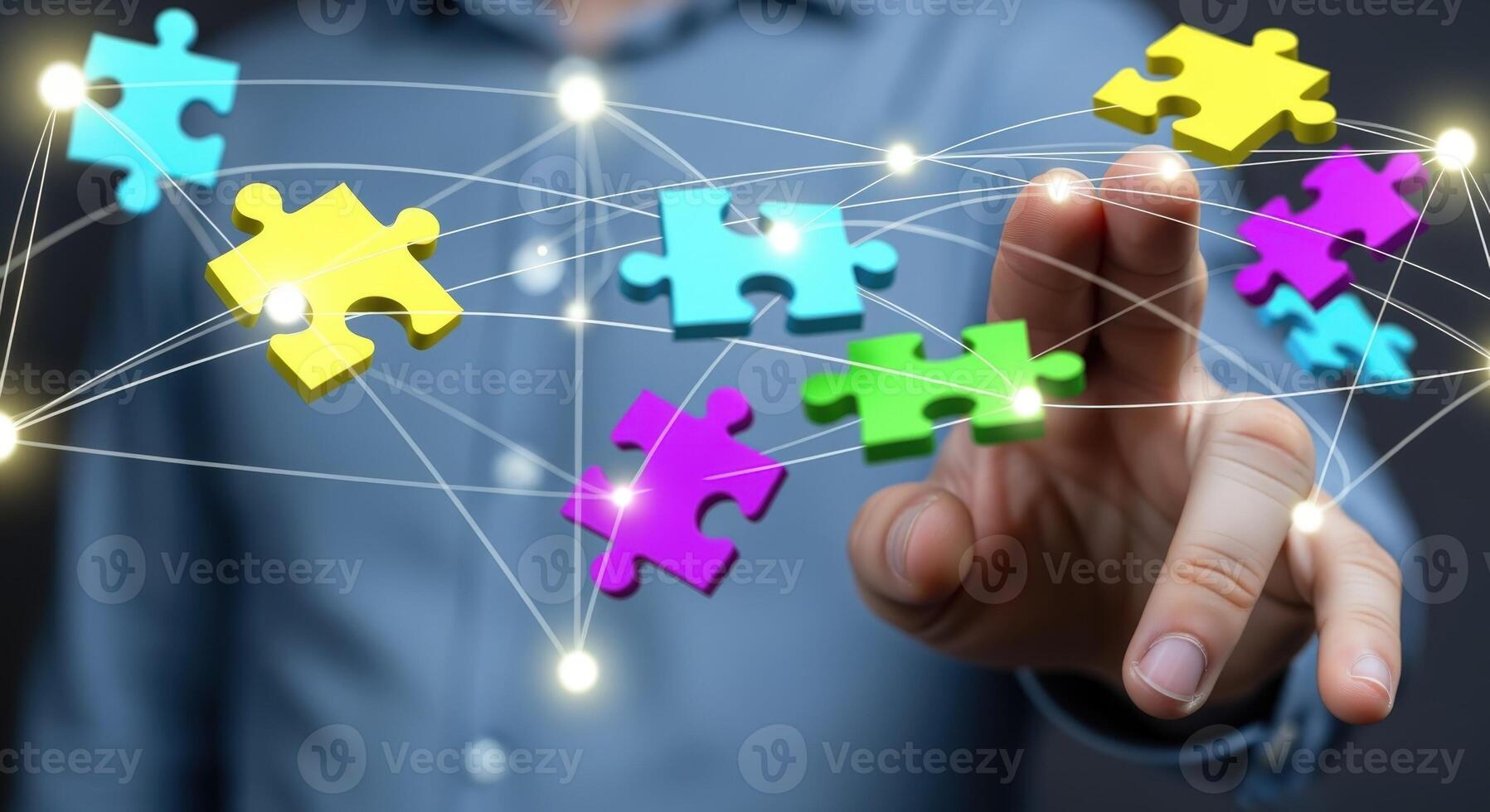 Conceptual Connection Hand Touching Illuminated Puzzle Pieces Representing Strategy, Solutions, and Networking in Business photo